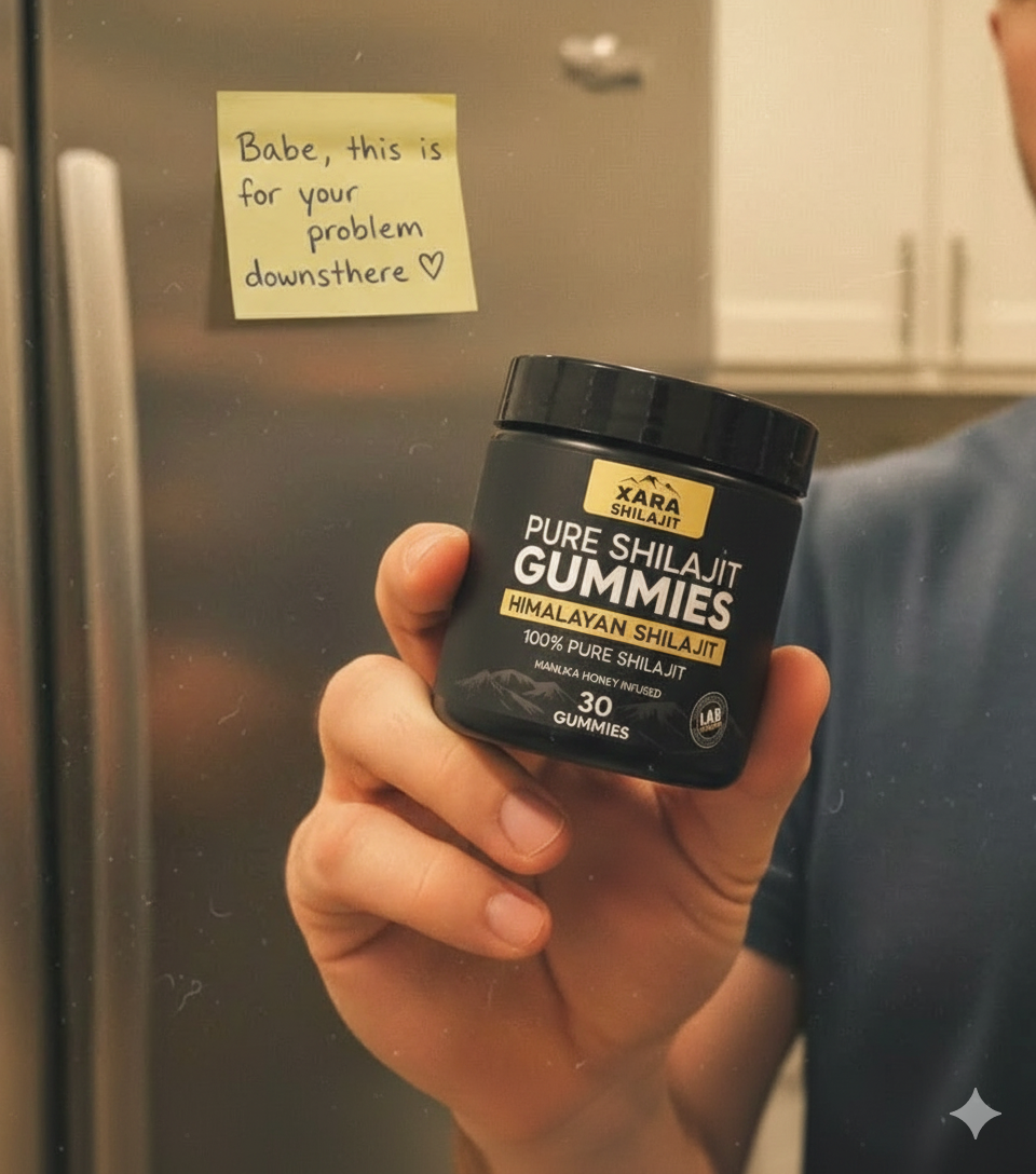 Couple sitting on opposite ends of couch, tension visible
